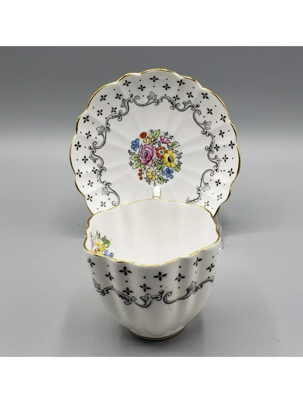 VTG Victoria C&E Teacup & Saucer Black Pattern Flower Medallion England Dainty